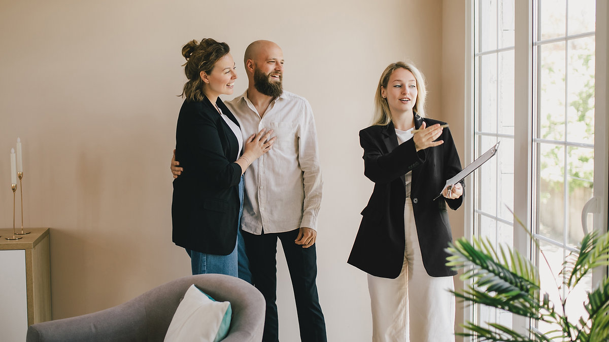 A buyers agent showing a property to clients